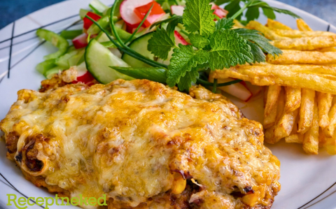 Karajszeletek ínyenc raguval sütve